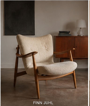 Fauteuil scandinave dans l'esprit Finn Juhl